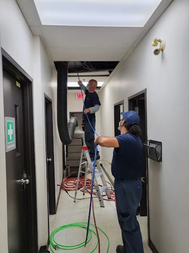 Duct cleaning in progress 13